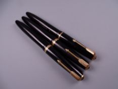 Three Vintage Black Parker Duofold fountain pens including one Maxima, all with 14k nibs