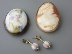 A CARVED CAMEO BROOCH mounted in silver gilt, an oval porcelain example in white metal mount with