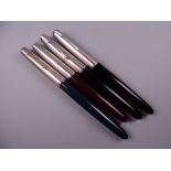 Four Vintage Parker 51 fountain pens (two black - missing jewel on one, one blue, one red)