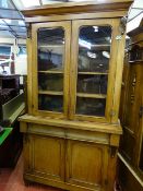 A VICTORIAN MAHOGANY TWO DOOR BOOKCASE CUPBOARD, 228 cms high, 121.5 cms wide, 43 cms deep