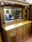 A GOOD HONEY OAK LATE VICTORIAN MIRRORBACK SIDEBOARD with good carved detail and chamfered panel