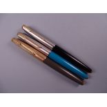 Three Vintage Parker 61 fountain pens (black, teal with stainless steel cap, grey with RG cap)