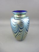 AN OKRA IRIDESCENT GLASS VASE, signed and numbered to the base, 16.5 cms high