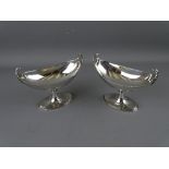 A PAIR OF PEDESTAL BOAT SHAPED SILVER SWEETMEAT STANDS by Hamilton & Inches, Edinburgh 1913, 9