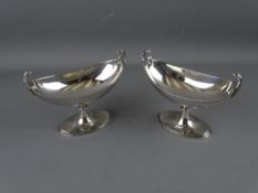 A PAIR OF PEDESTAL BOAT SHAPED SILVER SWEETMEAT STANDS by Hamilton & Inches, Edinburgh 1913, 9