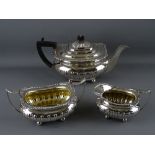 AN EXCELLENT THREE PIECE SILVER TEA SERVICE on ball feet, Sheffield 1911, 45 troy ozs gross