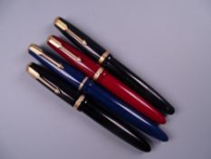 Four Vintage Parker Duofold fountain pens (two black, one blue, one red) all with 14k nibs