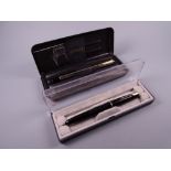 Vintage black Parker Junior fountain pen (14k nib) with gold plated trim (boxed) and a modern silver