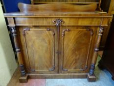 A VICTORIAN MAHOGANY CHIFFONIER SIDEBOARD with good carved detail and shaped railback, 108.5 cms