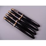 Four Vintage Black Parker Duofold fountain pens, all with 14k nibs