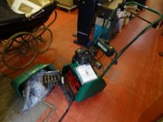 Qualcast Classic 35S petrol lawnmower and accessories