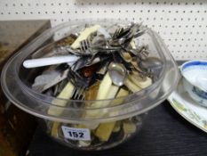 Tub of mixed cutlery