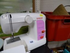 Singer featherweight sewing machine and accessories