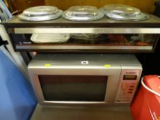 Sharp microwave oven and a Phillips three dish tabletop hostess food warmer E/T