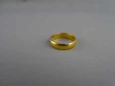 Twenty two carat gold wide wedding band, 10.3 grms, size 'U'