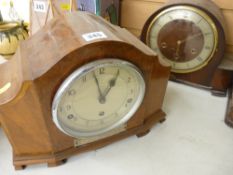 Art Deco walnut cased mantel clock with presentation plaque and an oak cased example