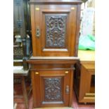 Two ornate wooden cabinets