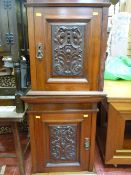 Two ornate wooden cabinets