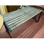 Slatted garden bench with cast iron ends
