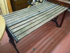 Slatted garden bench with cast iron ends