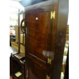 Early Victorian mahogany standing corner cupboard with panelled doors