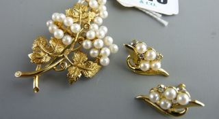 Nine carat gold leaf brooch, 8.6 grms, London 1910 encrusted with thirty one pearls and a pair of