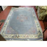 Washed Chinese rug with tasselled ends