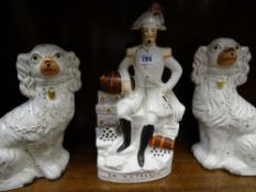 Pair of white Staffs dogs and a flatback figure of Napoleon