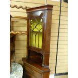 Standing corner cupboard with glazed top door