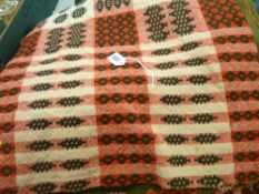 Vintage Welsh woollen blanket, traditionally patterned in green, red and black colours and a