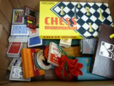Box of playing cards, cribbage boards, chess sets etc