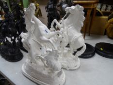 Pair of white painted spelter rearing horse figures on wooden bases