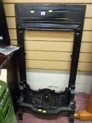Metal ornate fire surround and grate