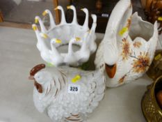 Pottery hen, swan planter and one other formed as a gaggle of geese