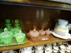 Two coloured glass dressing table sets and a parcel of colourful teaware