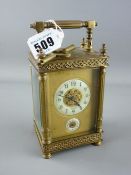 French brass cased carriage clock by Diette Hour, stamped 'D H', the dial marked 'Lausanne', in an