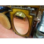 Oval bevelled mirror with a wooden frame