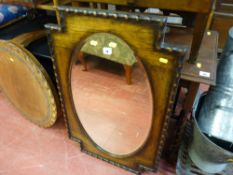 Oval bevelled mirror with a wooden frame