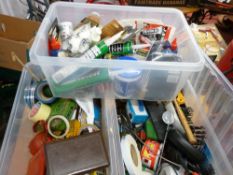 Three clear tubs of various garage items including drill bits, various sealant tubes and glues and