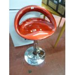Red seated chrome based bar stool