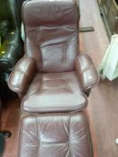 Burgundy leather effect swivel easy chair and matching footstool