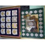 Twelve coin set of limited edition commemorative coins with pre-decimalization coin inlays and