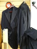 Black vintage tail suit and an Ede & Ravenscroft cap and gown