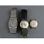 Gent's Omega Constellation Mega Quartz stainless steel wristwatch, an Eterna-Matic 1000 and an