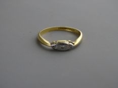 Eighteen carat gold and platinum ring set with tiny diamonds, 2 grms approx, size 'M'