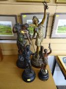 Four Victorian spelter figures on circular bases