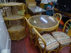 Bamboo and rattan circular conservatory table with four chairs and a corner unit