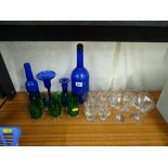 Two Babycham glasses and other drinks ware and four Bristol blue glass ornaments