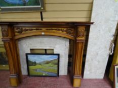 Pine carved floral and ornate fire surround with marble back and hearth