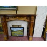 Pine carved floral and ornate fire surround with marble back and hearth